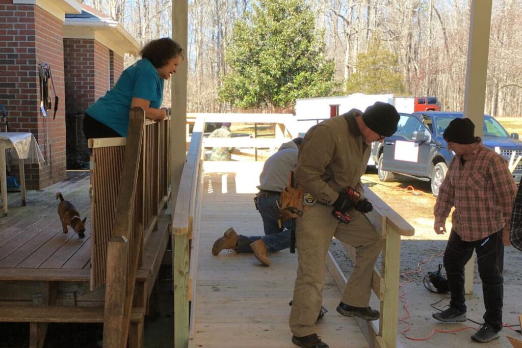 group of contractors building deck ramps