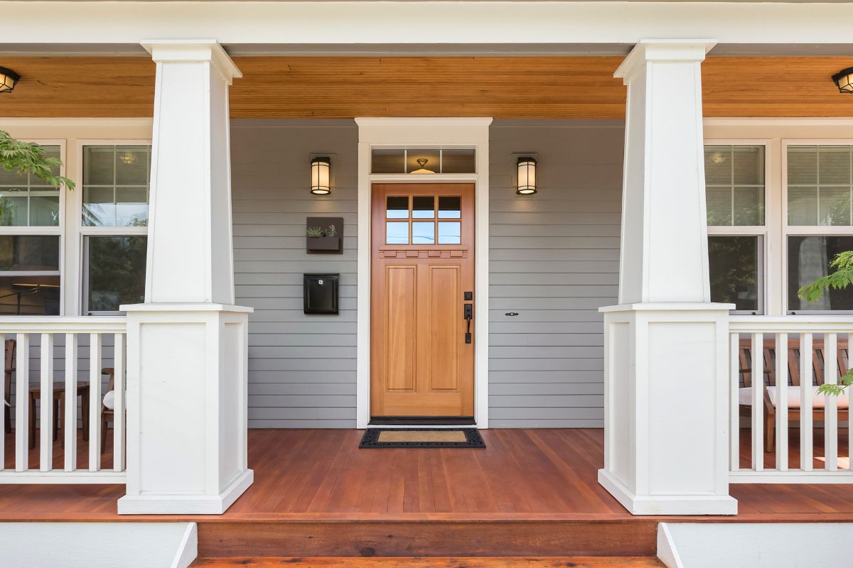 covered porch and front door of beautiful new home