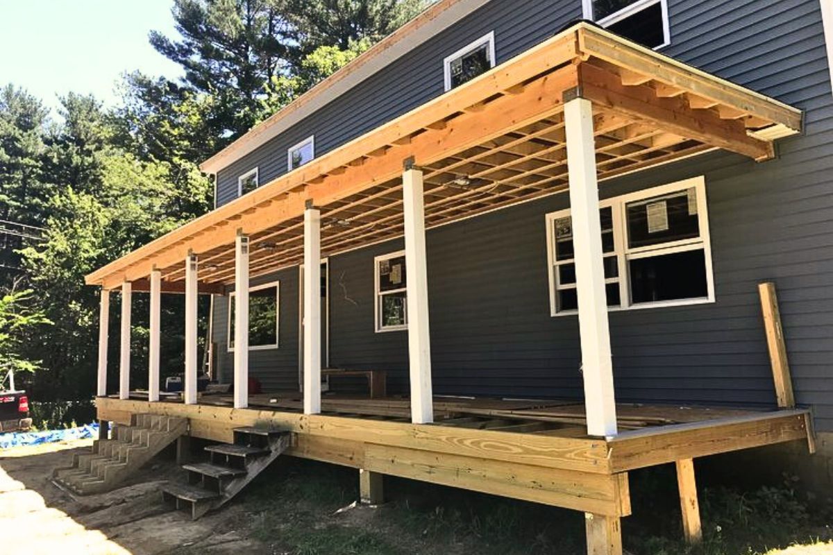 front porch deck being repair by professional contractors