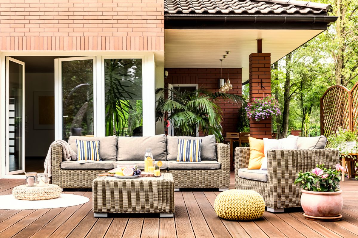 yellow pouf on wooden patio