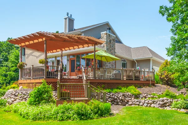 Beautiful Landscaped Yard and Deck with Pergola